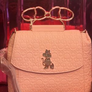 Loungefly Pink Backpack with Character Embossing